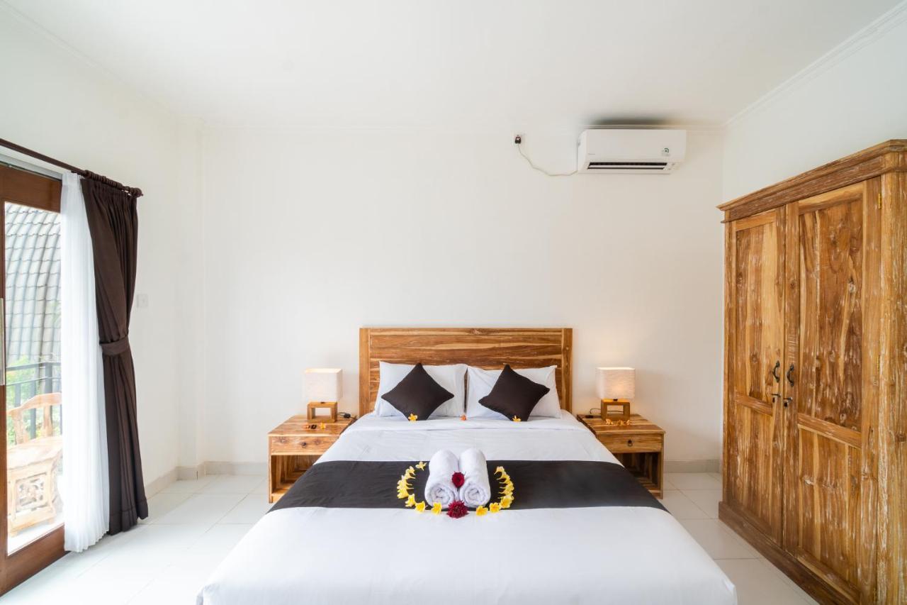 Wooden Puri Guesthouse Uluwatu Exterior foto